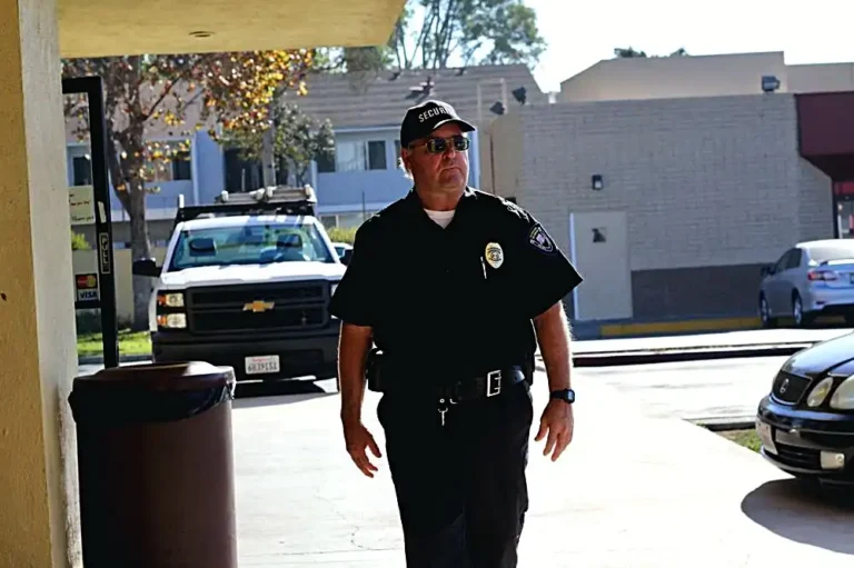 Safeguard On Demand standing guard on post outside a California building