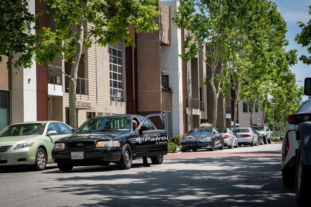 Safeguard On Demand marked patrol vehicle and officer providing event and venue security in California