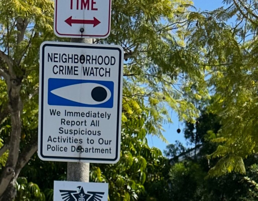 Safeguard On Demand no-trespassing signage posted at a gated HOA community