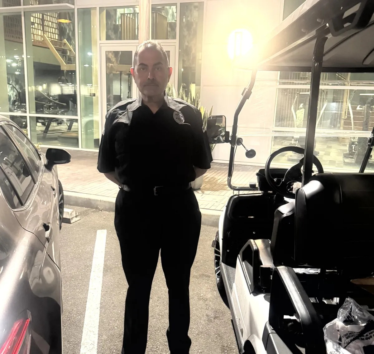 Safeguard officer on night patrol at a Los Angeles apartment community